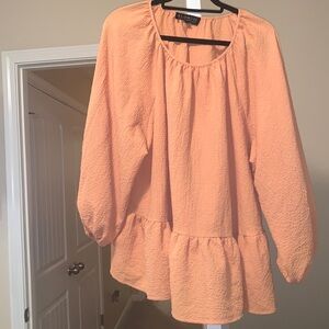 Eloquii orange peplum top